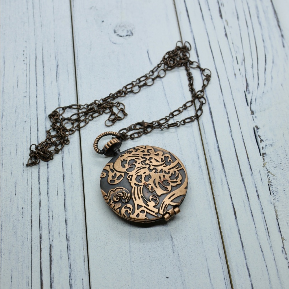 Large copper metal locket.